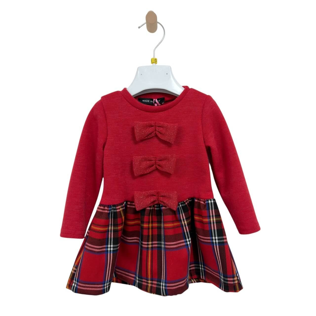 Abitino a maniche lunghe con fiocchetti decorativi